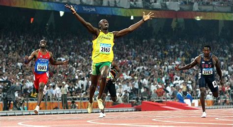 Usain Bolt celebrating his world-record gold medal winning 200m at the 2008 Olympic Games in ...