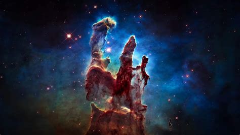 These towering tendrils of cosmic dust and gas sit at the heart of M16, or the Eagle Nebula. The ...