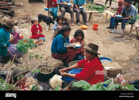 Group of people having food, Peru Stock Photo - Alamy