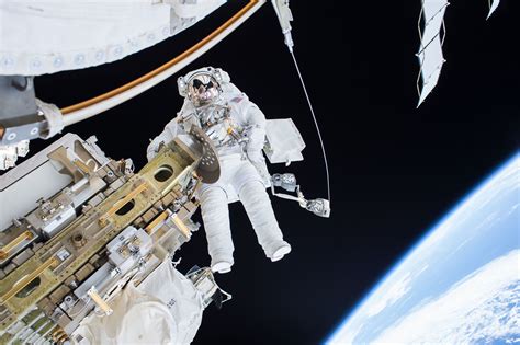 Watch NASA astronauts spacewalk to install a new dock for the International Space Station ...