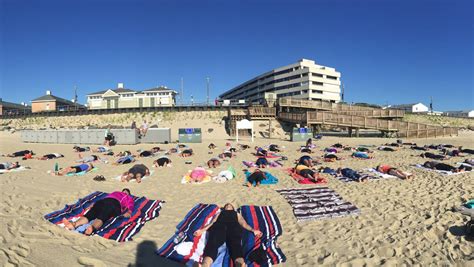 PHOTOS: A morning spent at beach yoga