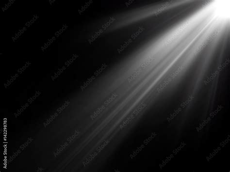 abstract beautiful rays of light on black background. Stock-Foto | Adobe Stock