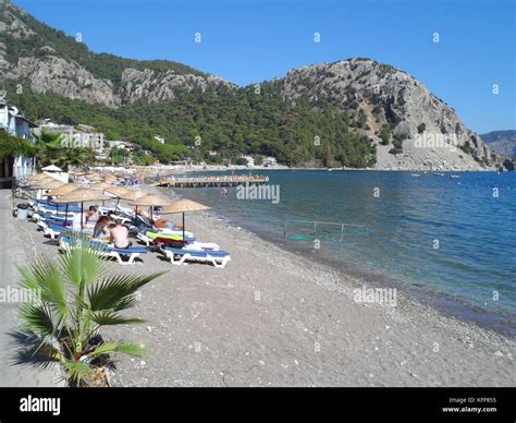 Public beach at the coastal village of Turunc, Turkey, Europe Stock ...