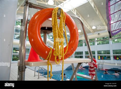 Close up of lifeguard station and rescue equipment at indoor public pool Stock Photo - Alamy