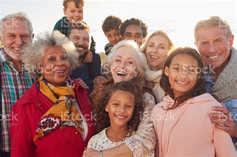 Portrait Of Multi-Generation Family Group On Winter Beach Vacation in 2020 | Winter beach ...