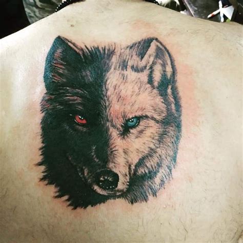 wolf tattoo | White wolf tattoo, Wolf eye tattoo, Wolf tattoo shoulder