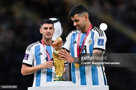 Cristian ROMERO of Argentina with the World Cup Trophy after the FIFA... News Photo - Getty Images