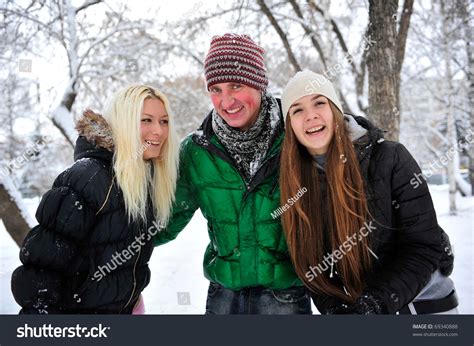 Happy People Outdoor In Winter Park Enjoying Themselves Stock Photo ...