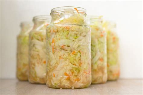 Sauerkraut Fermentation Canning in Glass Can. Cut White Cabbage ...