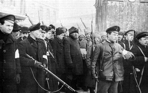 Patrol of armed students, workers, civilians, and Bolshevik soldiers in Petrograd, October 1917 ...