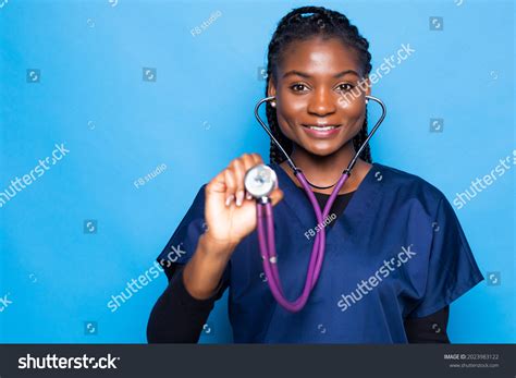 African American Young Nurse Holding Stethoscope Stock Photo 2023983122 | Shutterstock