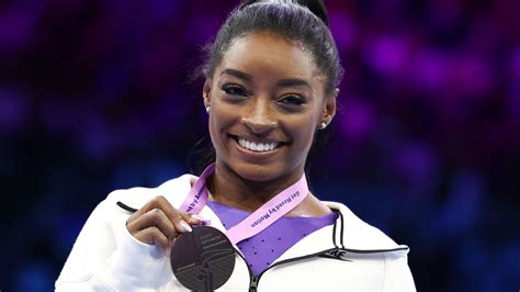 Simone Biles wins two more gold medals for USA at World Championships to extend gymnastics ...