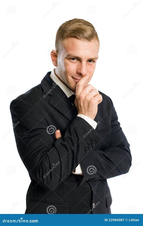 Businessman With Mischievous Smile Stock Image - Image of looking, elegant: 22984087