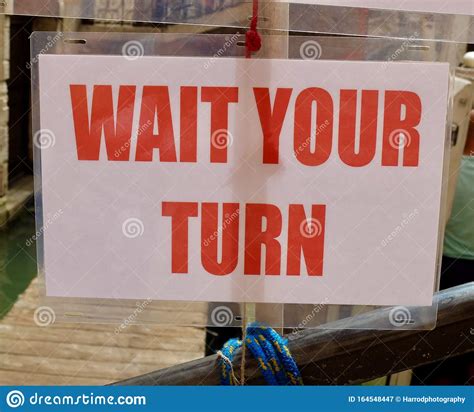 Wait Your Turn Sign in Red Lettering Stock Image - Image of business ...