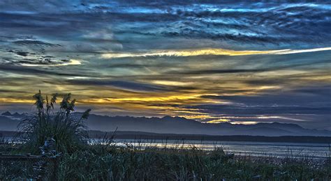 Sunset over the Olympic Mountains Photograph by Bob VonDrachek | Fine Art America