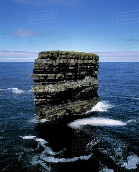 Rock Formations In The Sea, Greencastle, County Mayo, Republic Of Ireland - Stock Photo - Dissolve