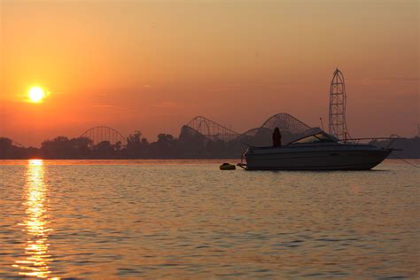 Sandusky Bay sunset with a view of Cedar Point in the background ...