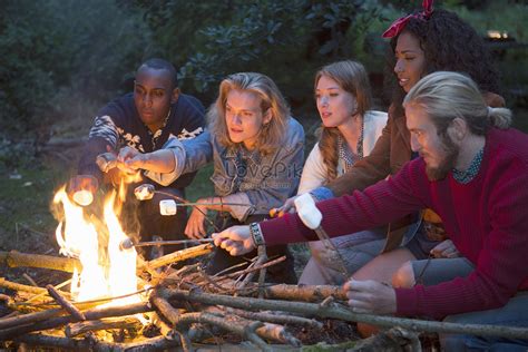 Friends Roasting Marshmallows By The Fire Picture And HD Photos | Free ...