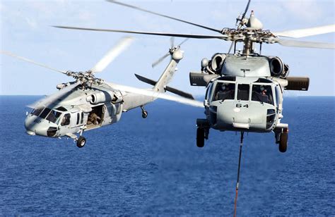 Two Mh-60s Knighthawk Helicopters Assigned To The Providers Of Helicopter Composite Squadron ...