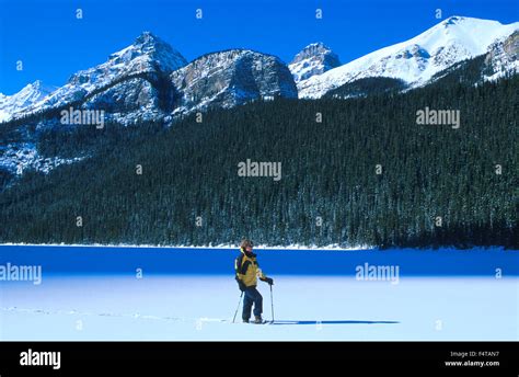 Snowshoeing at Lake Louise, Banff, National Park, Alberta, Canada MR 0009 Stock Photo - Alamy