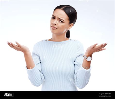 Portrait of confused woman shrug in studio, isolated white background ...