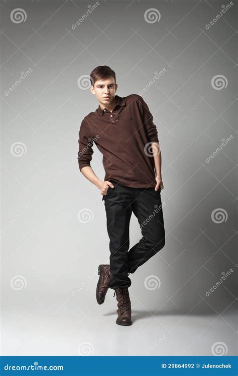 Young Male Fashion Model Posing In Casual Outfit Stock Photo - Image of portrait, length: 29864992