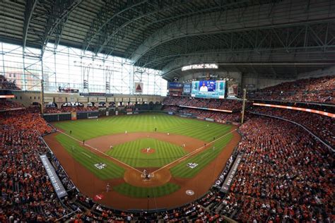 a baseball stadium filled with lots of people