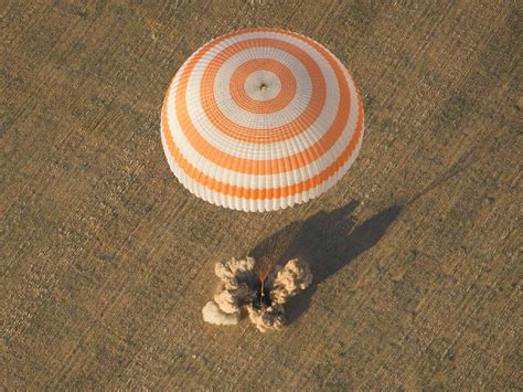 NASA photo of a Russian Soyuz spacecraft landing on the Steppes of ...