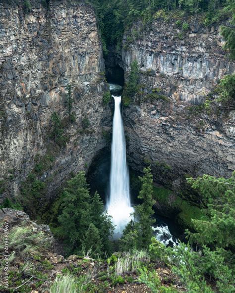 Waterfalls between rocky mountain Stock Photo | Adobe Stock