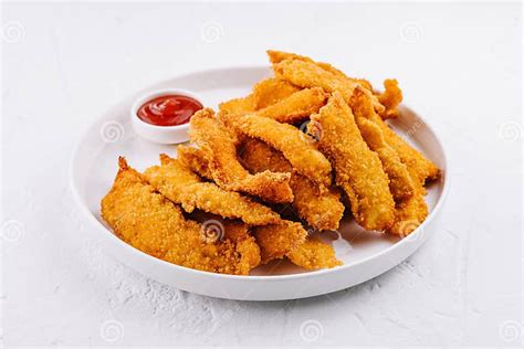 Crispy Breaded Chicken Strips with Dipping Sauce Stock Photo - Image of ...