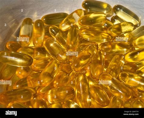 Cod liver fish oil capsules Stock Photo - Alamy