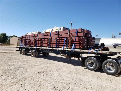 Steel building structures. Flatbed load of steel delivers in Artesia ...