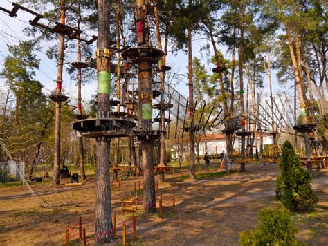 Attractions in the Park `Peremoga` on a Spring Day. Sky Park - Rope ...