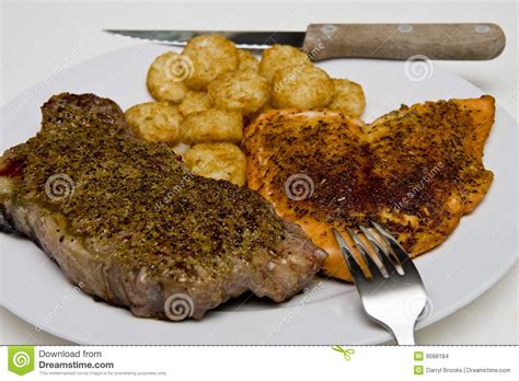 Steak Salmon and Potatoes stock photo. Image of prime - 9088184