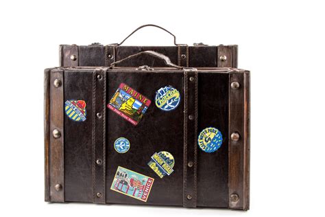 suitcase-with-stickers - TheZeroBoss.com