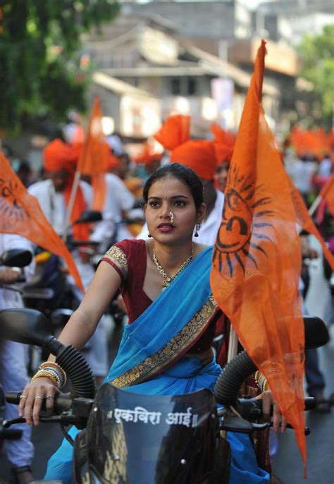 An Indian woman dressed in traditional attire takes part in a Gudi Padwa procession in Mumbai ...