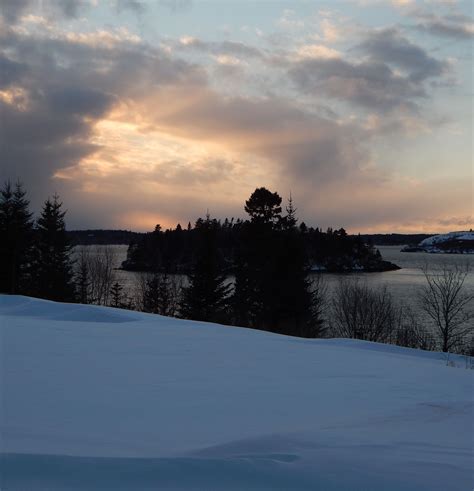 Snowy sunset on the Bay of Fundy | Sunset, Snowy, Cove