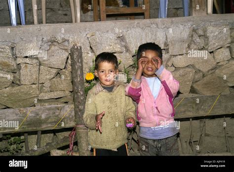 Two small indian boys kids making funny faces outdoors. India Stock Photo - Alamy