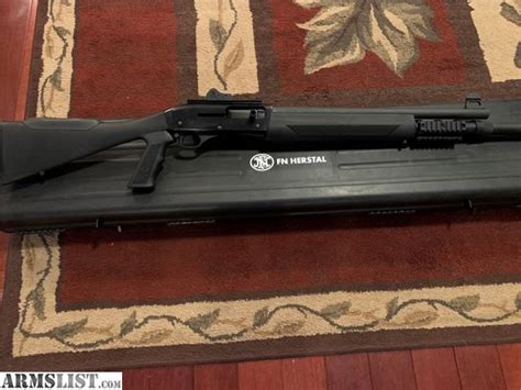 ARMSLIST - For Sale: FN SLP tactical shotgun 18”