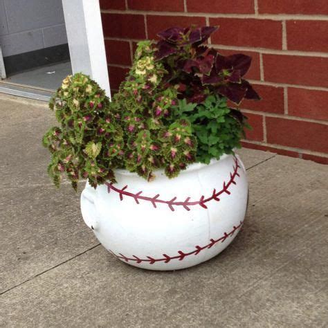 DIY...make a baseball planter...use any round planter..paint it white..add on the baseball ...