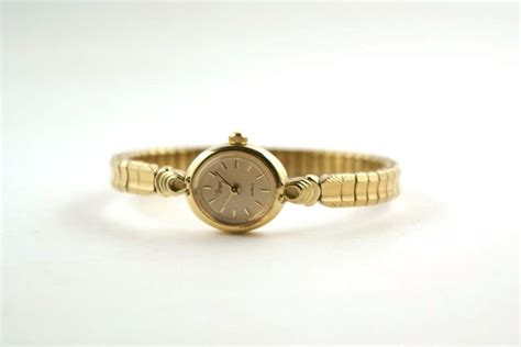 VIntage Ladies Timex Watch / Gold Stretch Band by VintageOnHudson