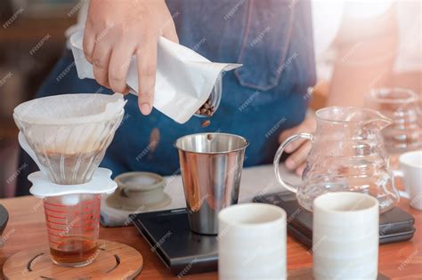 Premium Photo | Barista making coffee