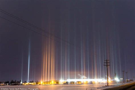 Extraordinary images show 'light pillars' dancing above houses | Holy ...