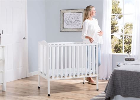 Portable Folding Crib with Mattress | Delta Children