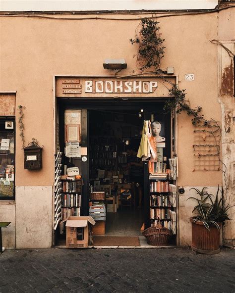 an open book shop on the side of a building