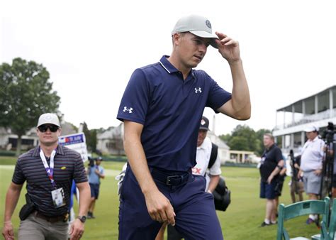 Jordan Spieth keeps a clean card in the mud for a 63 to lead the PGA Tour playoff opener - The ...