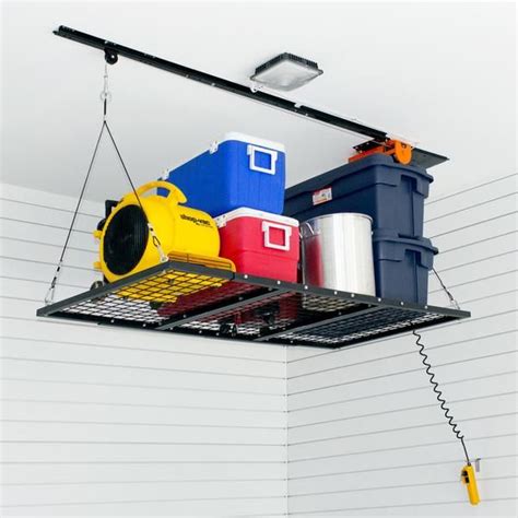 Platform Lifts – GarageGator in 2019 | Overhead garage storage, Garage storage, Garage ...