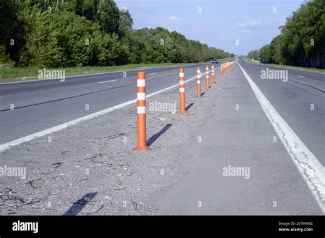 Asphalt road with markings Stock Photo - Alamy