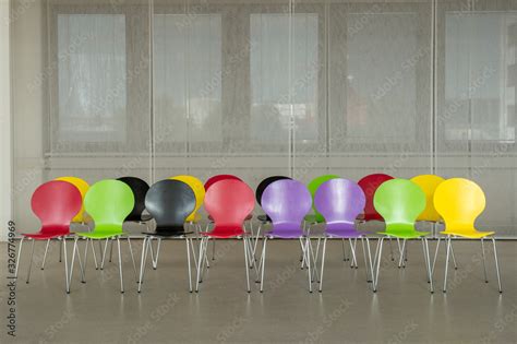 row of color chairs.. Stock Photo | Adobe Stock