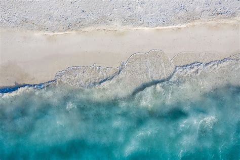 Aerial View Of Sandy Beach And Ocean Photograph by Levente Bodo - Fine ...